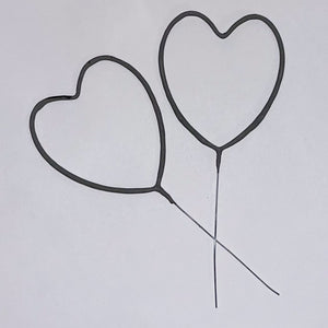 Pack of 36 heart sparklers against white background mesmerizing guests at wedding sendoff