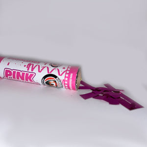 Pink confetti cannon with pink paper confetti