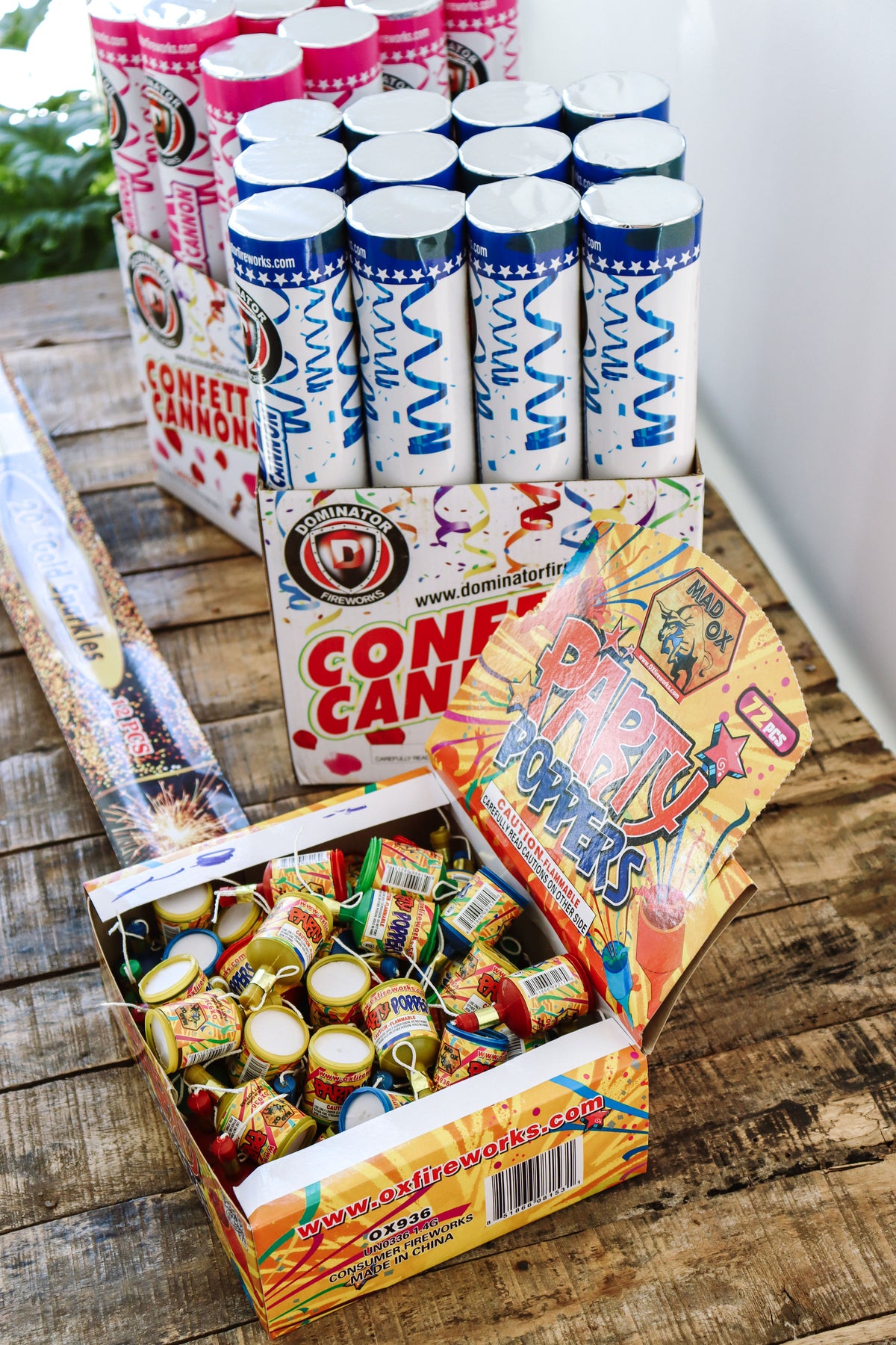 Group of People Celebrating with Confetti Poppers