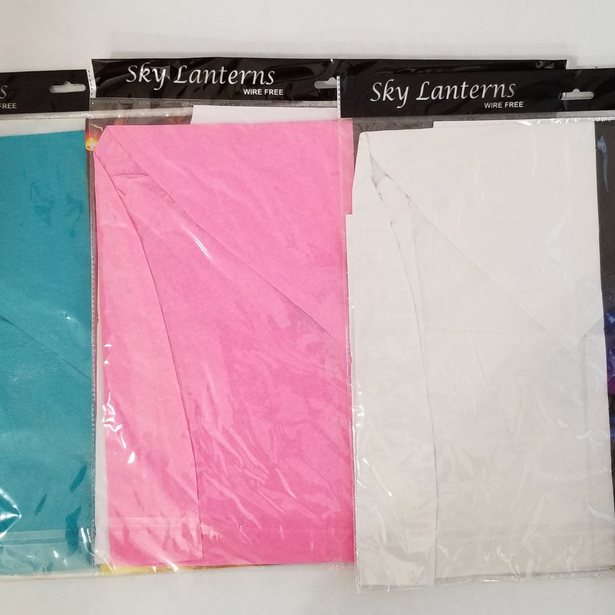 White Chinese lantern, blue wishing lantern, pink floating lantern