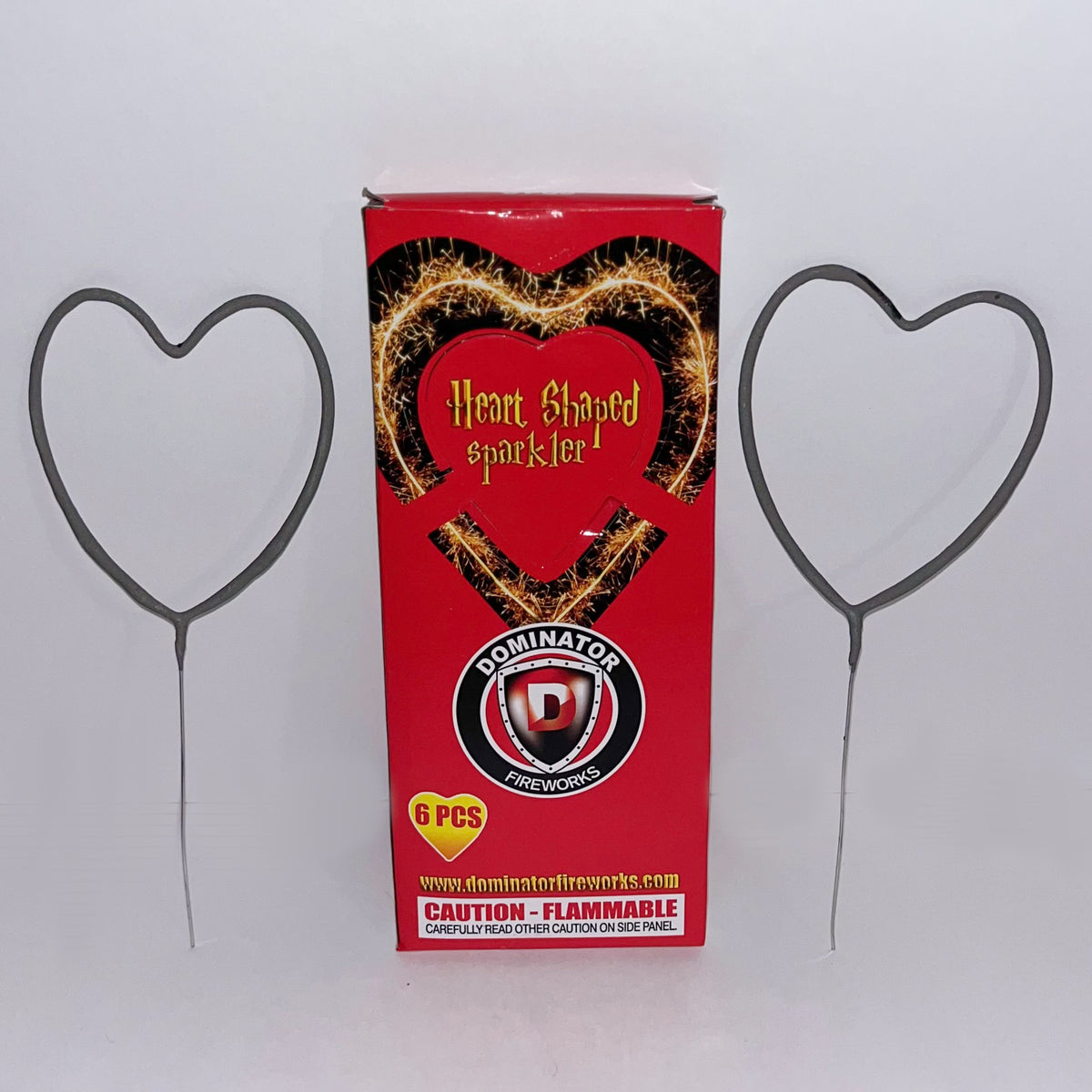 Two Heart sparklers and sparkler box against white background 