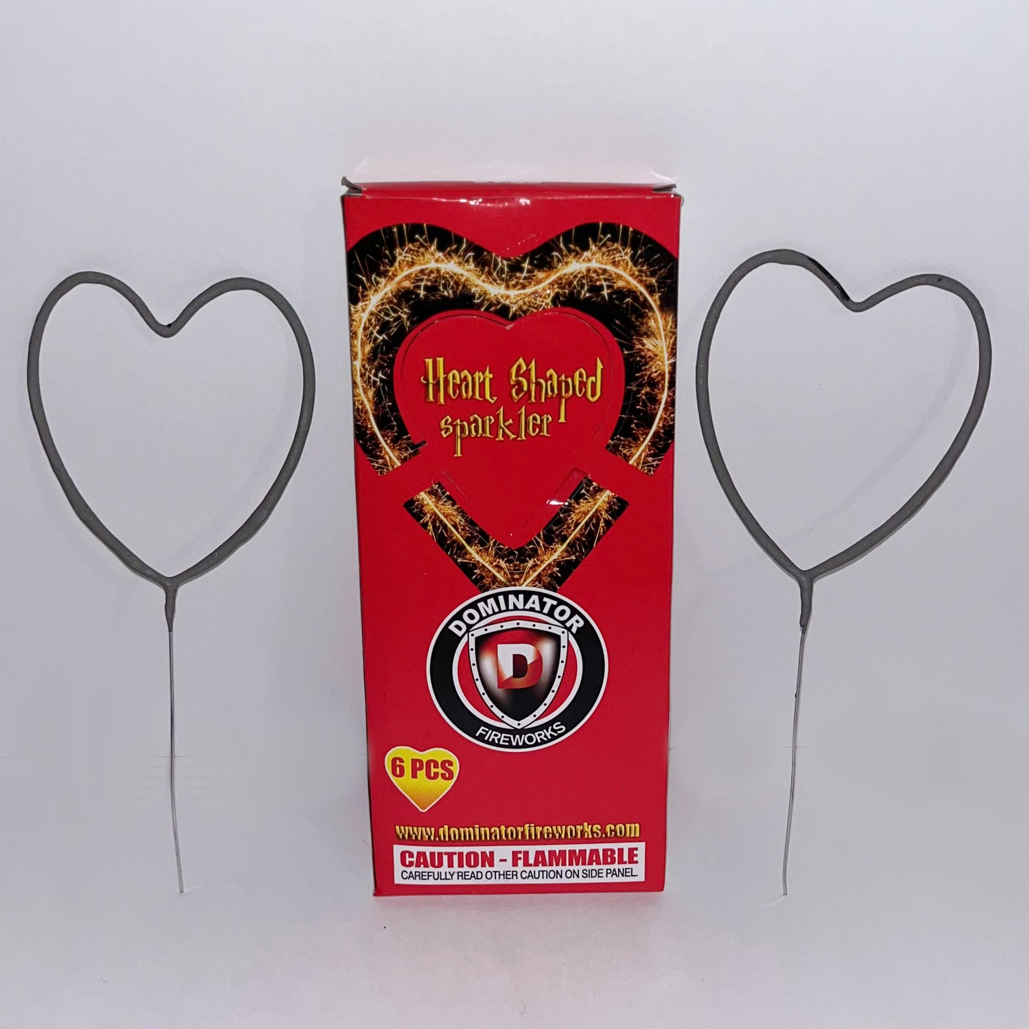Two Heart sparklers and sparkler box against white background 