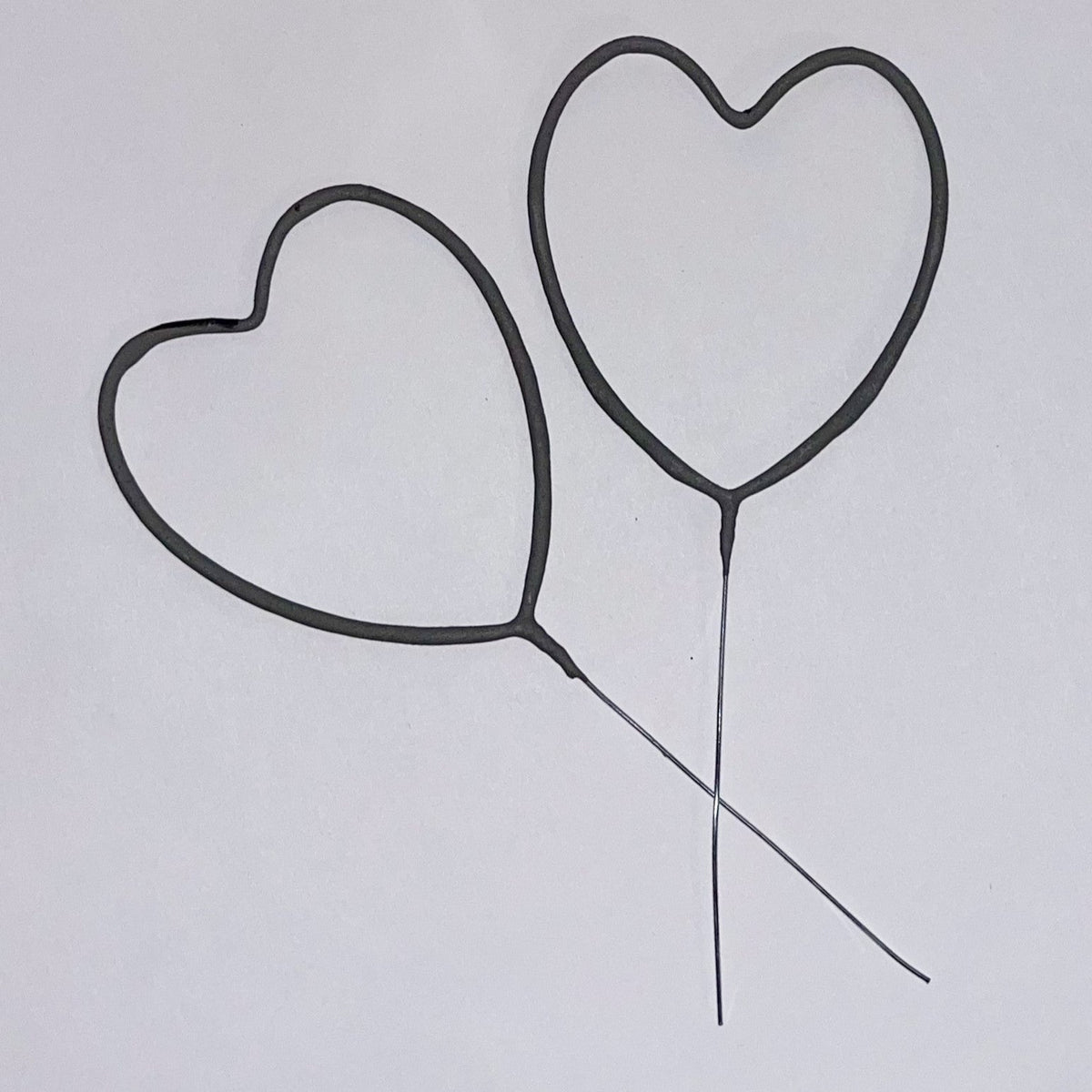 60 second heart sparklers burning down both sides creating lasting, beautiful wedding pictures