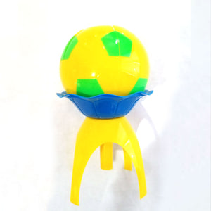yellow and green soccer ball birthday cake candle plays Happy Birthday and opens with surpride