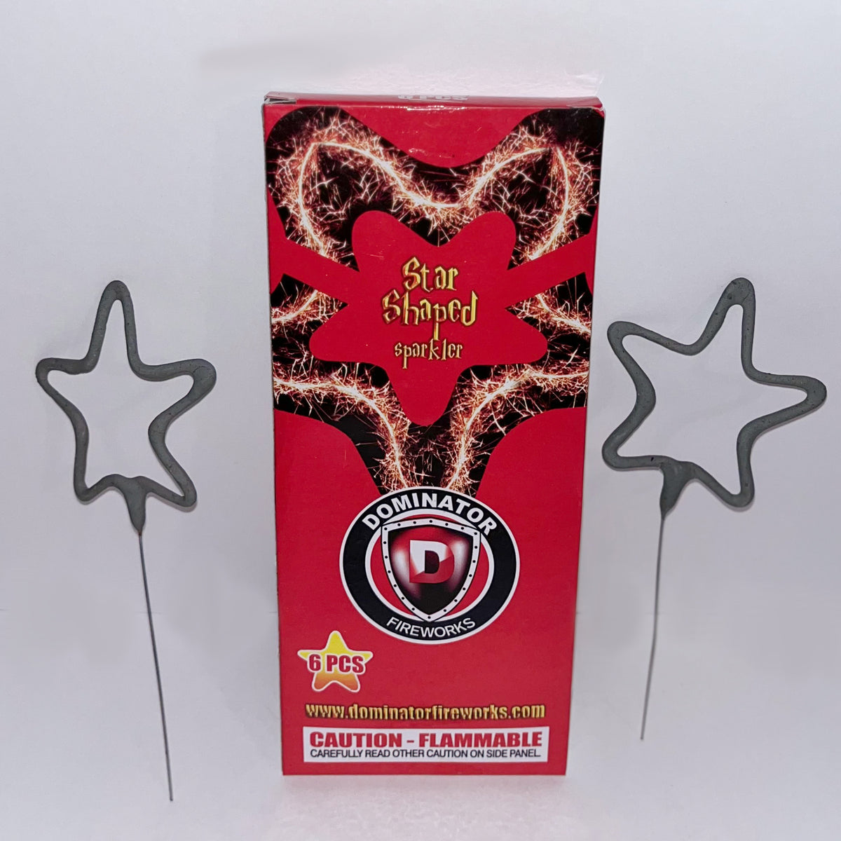red box and two star sparklers with gray metal handle against white background