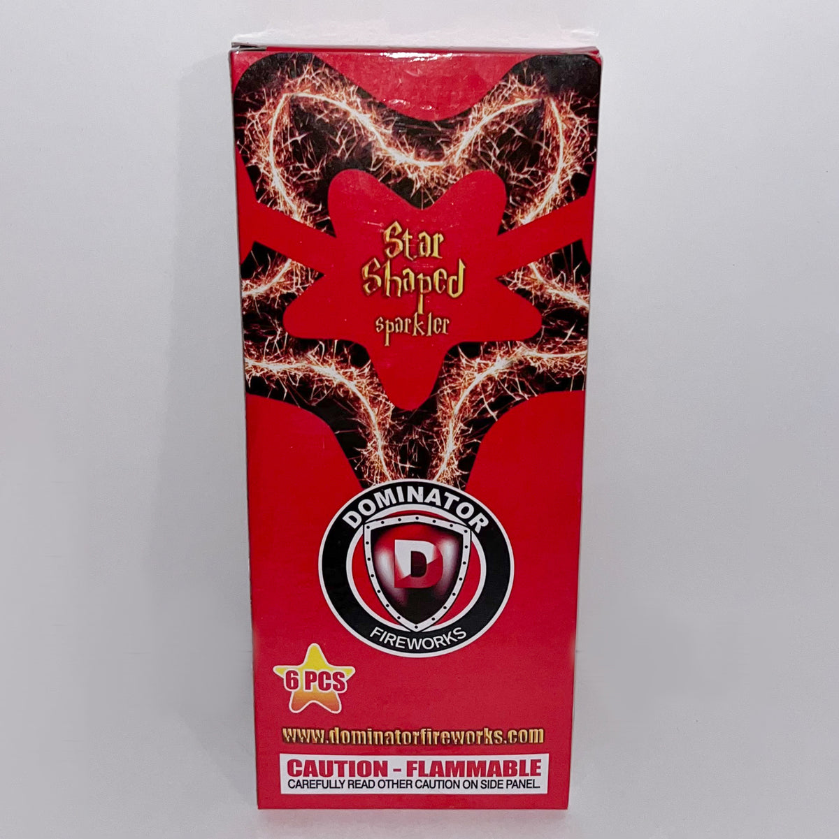 red box with a picture of lit star sparkler with gold sparks